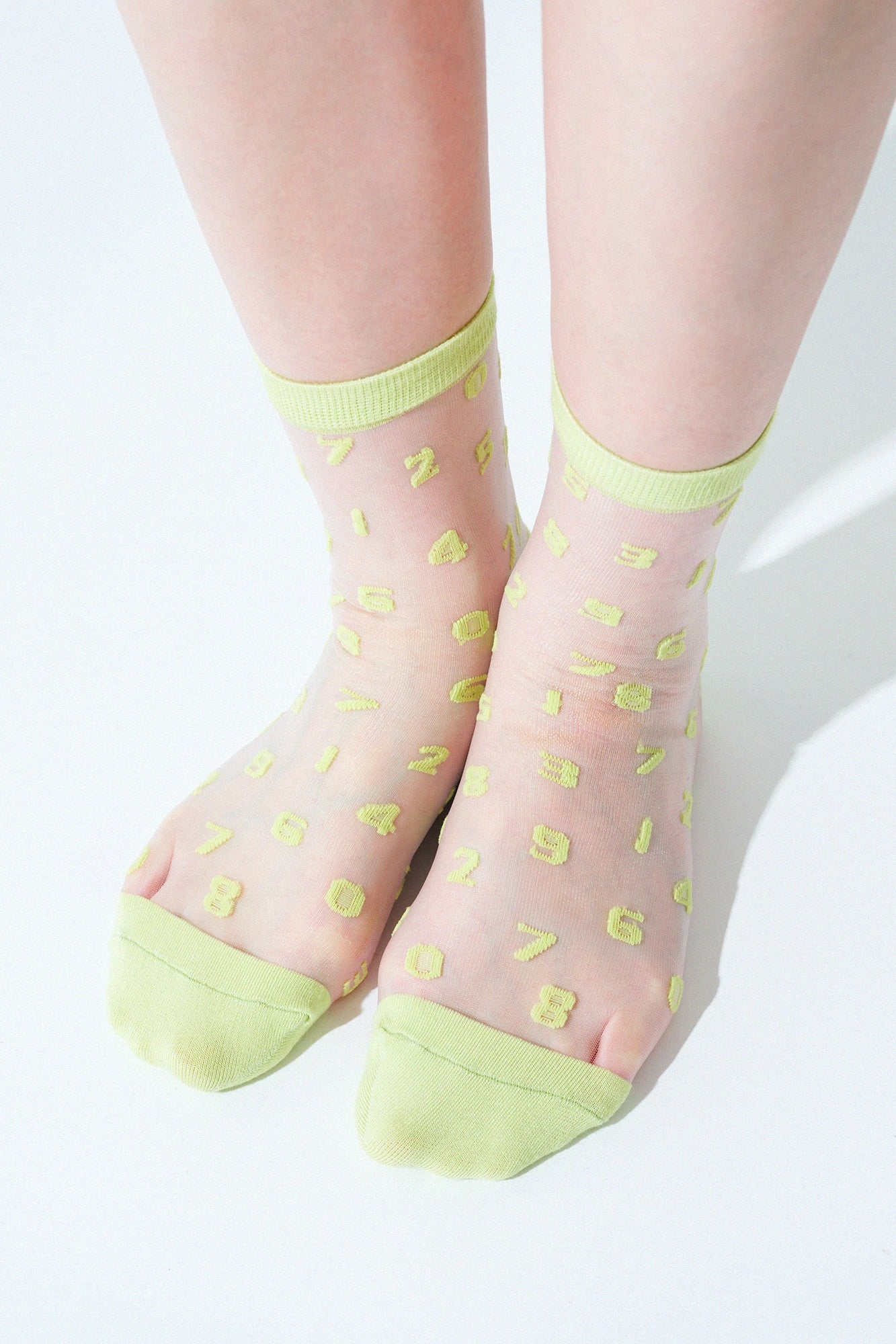 Transparente Textilsocken/SO-SU-U lindgrün